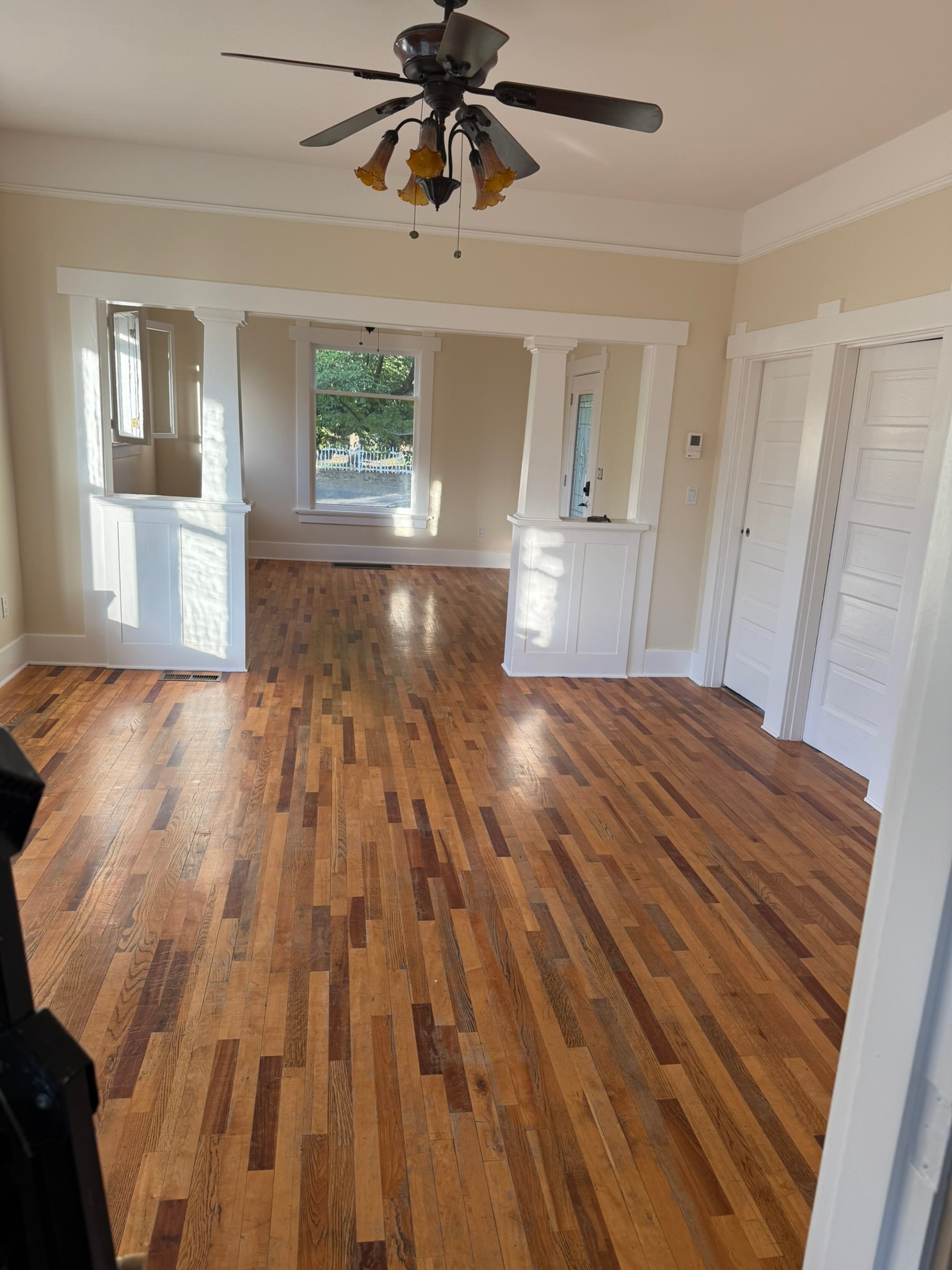 Residential interior room with freshly painted walls and trim